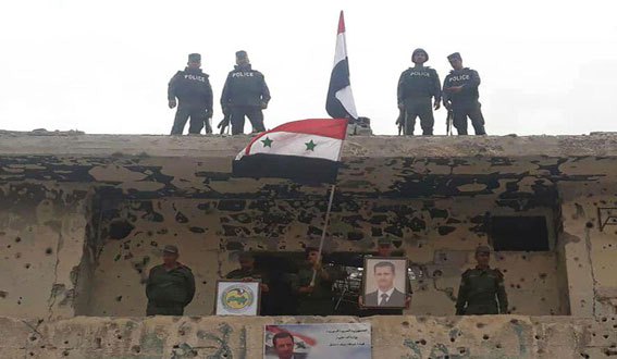 دام برس : العلم الوطني يرفرف في مخيم اليرموك والحجر الأسود