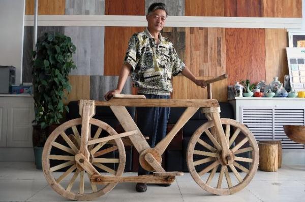 دام برس : دام برس | نجَّار صيني يصنع دراجة من الخشب بالكامل
