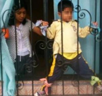 دام برس : مكسيكية تقيد طفلها إلى نافذة المنزل